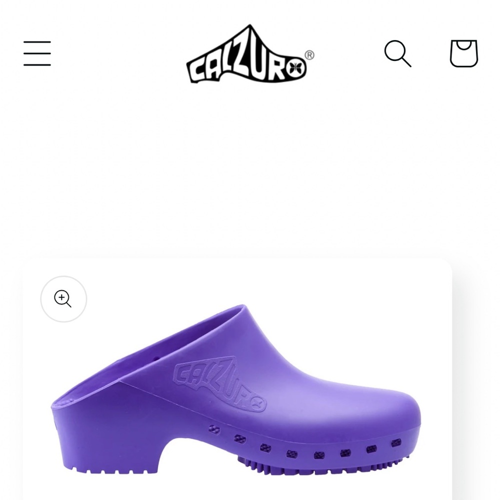 Calzuro purple clogs without holes. Size 38 in great condition.